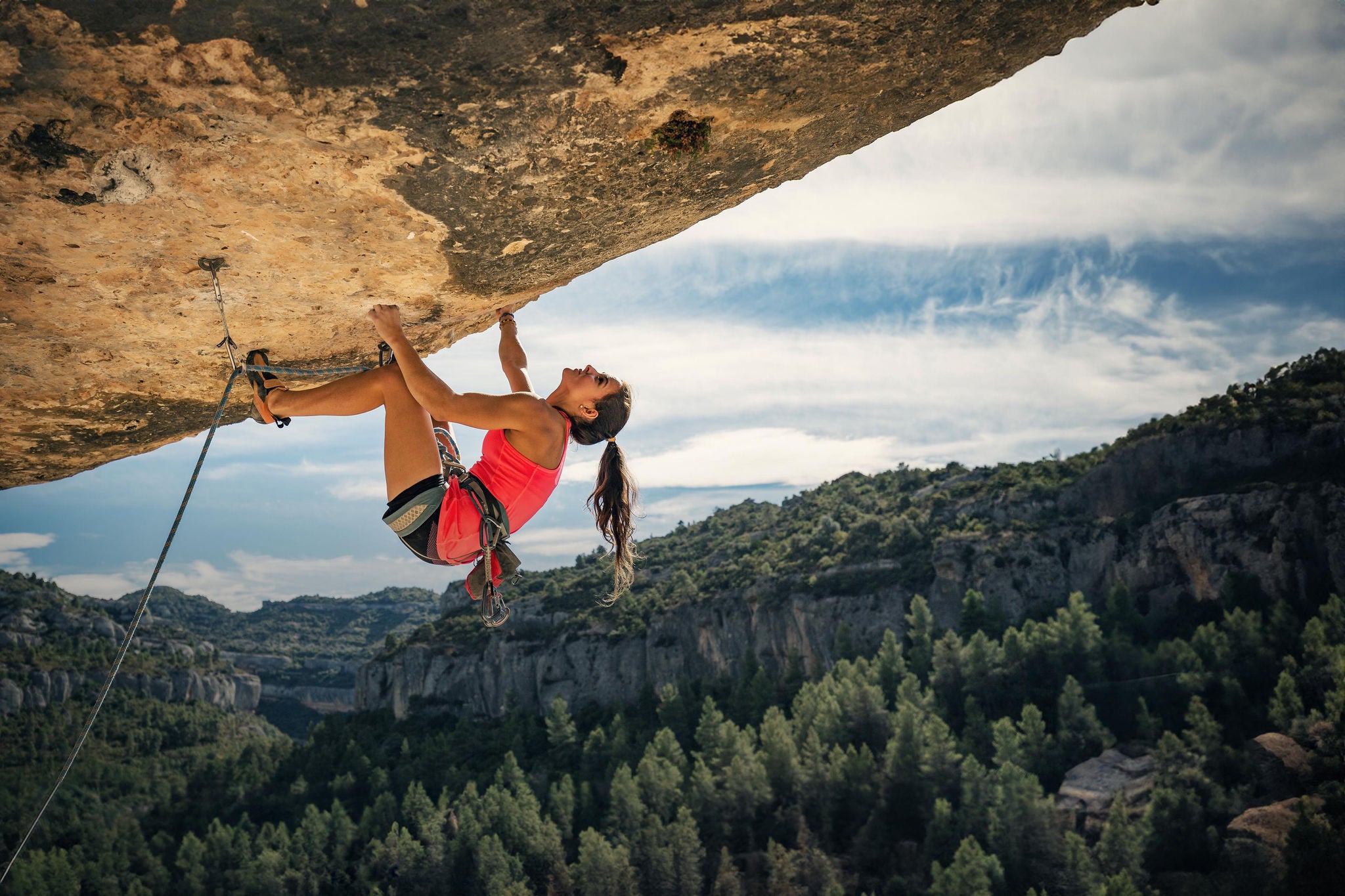 Female rock climber in margalef catalonia spain